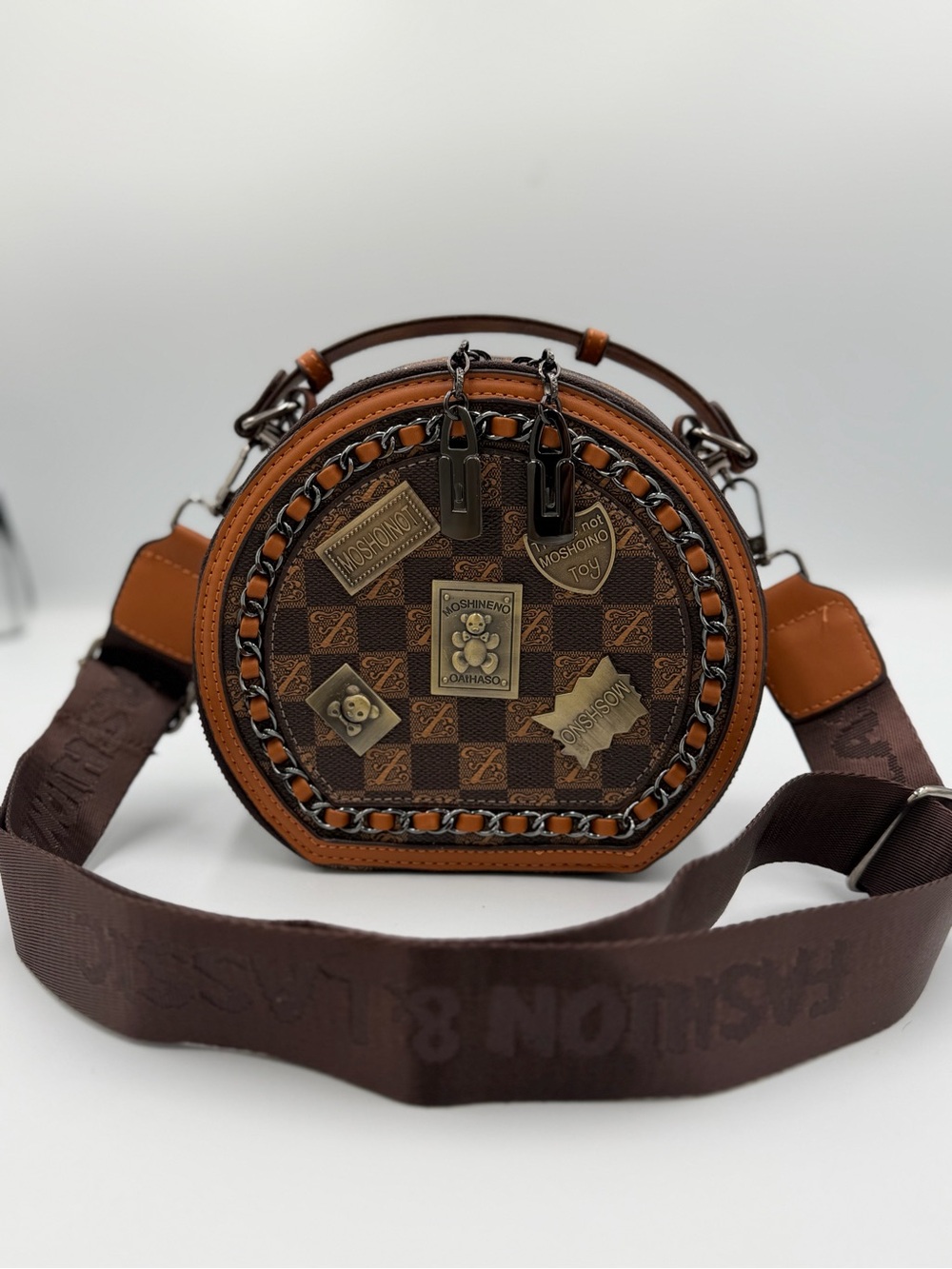 Round Brown Crossbody Bag with Gold Accents